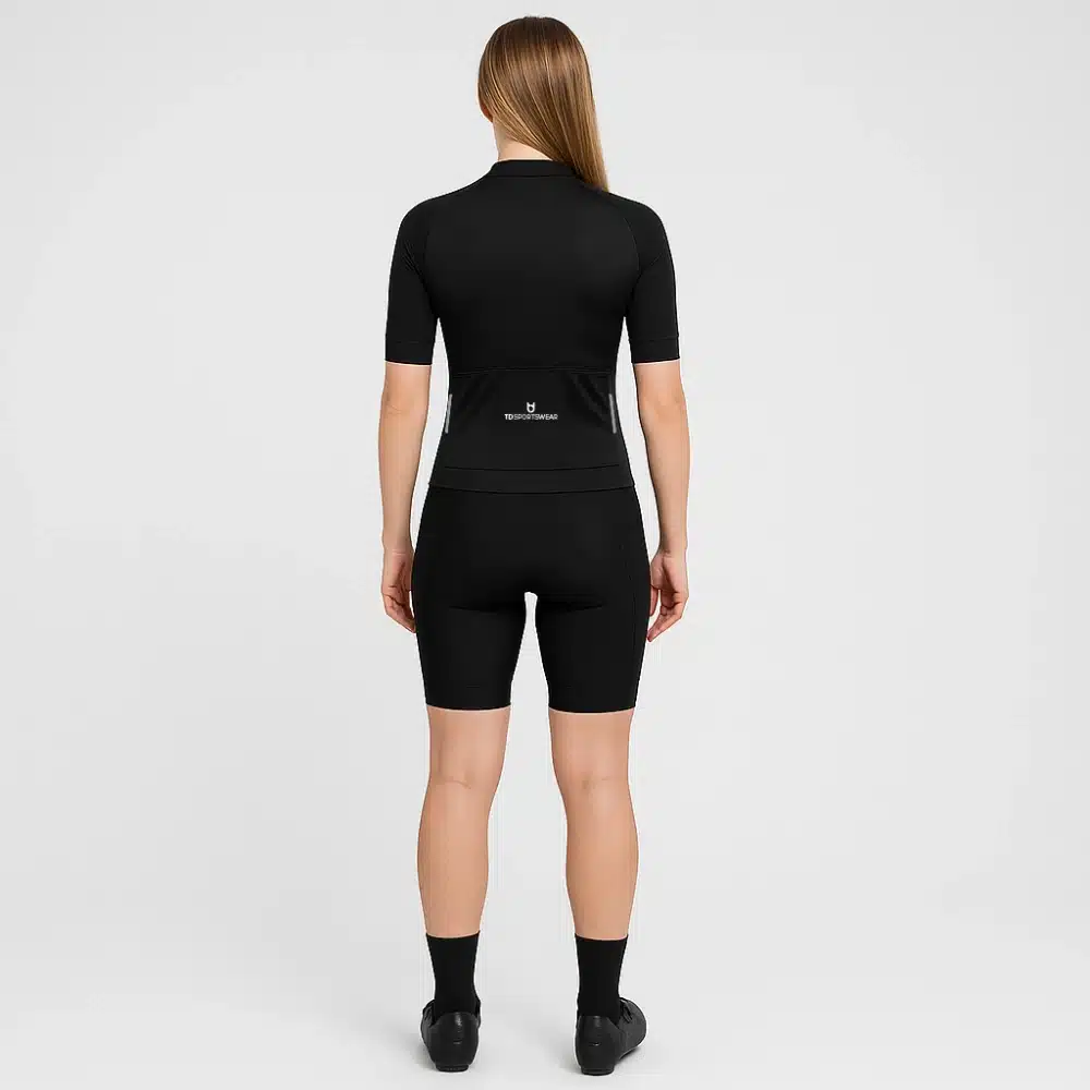 Back view of women’s Pro 800 cycling jersey – sleek race cut with rear storage, mesh back, and reflective elements for pro-level riding