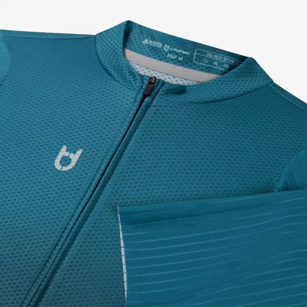 Close-up of the Elite 1200 zipper and collar construction with moisture-wicking fabric.